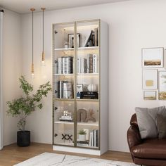 a living room filled with furniture and a book shelf