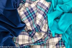 Thistle Marine tartan with matching Bonnie Marine velvet on the left and Bonnie Aqua velvet on the right. Scottish Tartan Aesthetic, Flower Of Scotland Tartan, Match Velvet, Macintosh Clan Tartan, Pride Of Scotland Tartan, Kilt Outfits