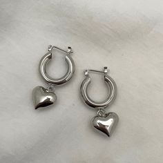 Oh so charming, these Puffy Heart Hoop Earrings are the perfect piece for making a statement. Lightweight, perfect for everyday wear. 18kt gold or platinum plated 40 mm hoop earring length is approximately 1.5 inches lightweight Heart Hoop Earrings, Puffy Heart, Handmade Clay, Piercing Jewelry, Clay Jewelry, Pretty Things, My Jewellery, Gold Earrings, Piercings