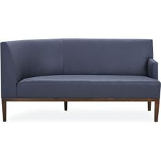 a blue couch sitting on top of a wooden frame