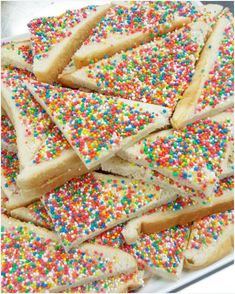 a plate full of sprinkles and white bread