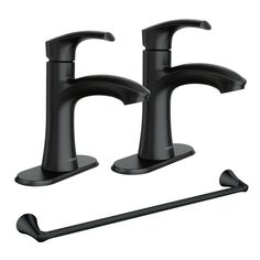 two black bathroom faucets with handles and soap dispenser