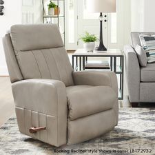 a living room with a couch, chair and coffee table