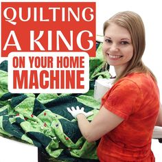 a woman holding up a quilt with the words quilting is king on your home machine