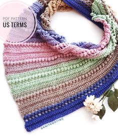 a crocheted scarf with flowers on it and the text, free pattern us items