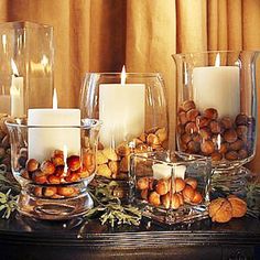 there are candles and nuts on the table