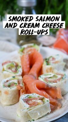 smoked salmon and cream cheese roll - ups on a white plate with text overlay