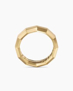 a gold ring on a white background