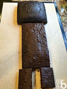 some brownies sitting on top of a cutting board