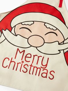 a santa claus apron with merry christmas written on it