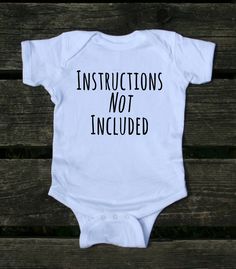 a white baby bodysuit that says i'm not a regular baby, i'm a cool baby