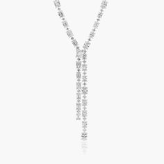 14K White Gold Cascading Lab-Created Diamond Lariat Necklace. Not for the faint of the heart This glorious lab-created diamond lariat necklace is a head-turner! A modern, asymmetrical necklace that features one side of emerald cut diamonds, while the other side has oval cut diamonds. Luxury Lariat Diamond Necklace For Formal Occasions, Diamond Solitaire Necklace Long, Diamond Lariat Necklace For Wedding, Diamond White Lariat Necklace Fine Jewelry, Diamond White Lariat Necklace In Fine Jewelry, Fine Jewelry Diamond Lariat Necklace For Wedding, Fine Jewelry Lariat Diamond Necklace For Wedding, Wedding Fine Jewelry Lariat Diamond Necklace, Lariat Diamond Necklace For Wedding, Fine Jewelry