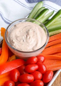 carrots, celery, and other vegetables with dip