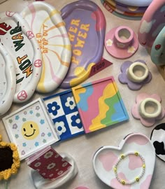 there are many plates and other items on the table with it's name written