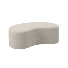 an oval shaped ottoman in white fabric on a white background, with the top half covered by