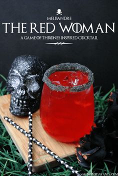 the red woman cocktail is garnished with sugar