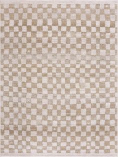 a beige and white rug with squares on it