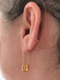 These edgy earrings are large safety pins. Pin clips at bottom of earring. Choose from gold plated or white gold (silver) plated. 1.25" long. Edgy Gold Earrings, Safety Pin Earrings Aesthetic, Gold Safety Pin Earrings, Gold Clip On Earrings, Bday Jewelry, Close Pin, Pins Earrings, Gift Wishlist, Bday Wishlist