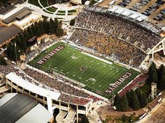 an aerial view of a football stadium filled with people