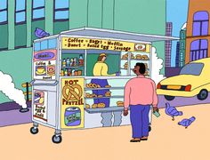 a man standing in front of a hot dog stand with birds flying around and cars parked on the street