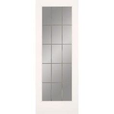 a white door with glass panels on the side