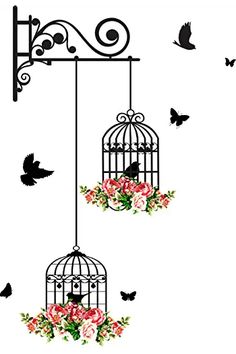 two bird cages with flowers and birds flying around them, one is hanging from the ceiling