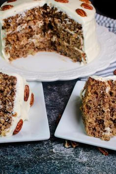 three slices of carrot cake on plates with one slice missing from the cake and another half eaten