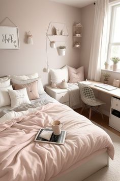 a bedroom with a bed, desk and window in the corner that has pink sheets on it