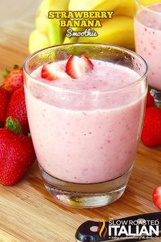 two glasses of strawberry banana smoothie with strawberries