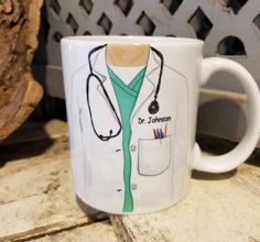 a coffee mug with a doctor's coat on it