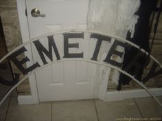 the door is decorated with metal letters