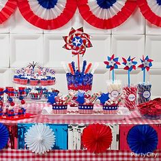 a table with red, white and blue decorations