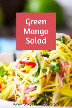 green mango salad in a white bowl with the words, green mango salad above it