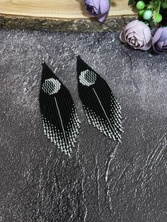 Black long earrings with moon. Made from Czech beads. Length 4.8 inches(12cm). Width 1.2 inches(3cm). Hypoallergenic clasp. If you want these earrings in a different color, write to me and I will be happy to make them for you. >Back to my shop: https://www.etsy.com/shop/jewelrybylarisa?ref=seller-platform-mcnav Handmade Black Moon Earrings, Handmade Black Moon-shaped Earrings, Black Moon Phase Jewelry For Festivals, Black Beaded Earrings With Ear Wire For Festival, Black Beaded Earrings For Festival, Black Moon Phase Earrings, Handmade Black Crescent Earrings, Black Round Beads Earrings For Festival, Adjustable Black Crescent Earrings