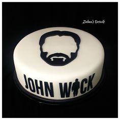 a cake with a beard and mustache on it's side that says, john wick