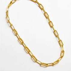 Perfectly sized 18 karat gold vermeil oblong links alternate between a textured and smooth finish to create a dazzling piece to add to your jewelry collection. Whether worn as a lariat or a regular chain, the versatile sizing provides an array of styling options. The seamless clasp design allows you to customize your look with a chain length up to 19". Perfect for layering or stacking with other charms or chains. Dressed up or down, this stunning and high-polished vermeil necklace frames your fa Timeless Gold Oval Link Chain Necklace, Timeless Gold-plated Cable Chain Necklace, Yellow Gold Chain Necklace With Adjustable Rectangular Links, Elegant Toggle Necklace With Cable Chain And Rectangular Links, Gold Timeless Chain Link Necklace, Formal Rectangular Delicate Chain Necklace, Yellow Gold Toggle Necklace With Paperclip Chain, Classic Gold Toggle Necklace With Rectangular Links, Gold Oblong Jewelry With Adjustable Chain