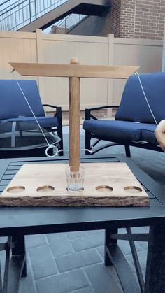 a wooden cross sitting on top of a table