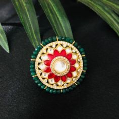 Jaipuri Ruby Emerald Kundan Ring / Emerald Amrapali Rajwadi Ring / Sabyasachi Ring /Statement Indian Wedding Ring / Pakistani Jewelry Made in Brass with very Kundan, Ruby and Emerald Green Semi-precious stones Handmade Meenakari, Kundan Jadau Statement Ring Width: 1 Inches Adjustable Ring Lightweight Jewelry Suitable for any traditional or contemporary occasion High quality and craftsmanship. Facebook: www.facebook.com/shoparyafashions Pinterest: www.pinterest.com/aryafashions Instagram: www.ins Round Cutdana Jewelry For Puja, Traditional Ceremonial Ring Jewelry, Traditional Kundan Wedding Jewelry With Cutdana, Ceremonial Round Tikka With Tilla Detail, Ceremonial Round Tikka With Tilla, Traditional Kundan Rings With Hand Set, Bollywood Style Kundan Jewelry For Festive Occasions, Bollywood Style Kundan Wedding Jewelry For Festive Occasions, Ceremonial Meenakari Rings