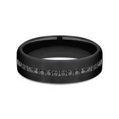 a black wedding band with diamonds on it