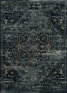 an area rug with dark blue and beige colors