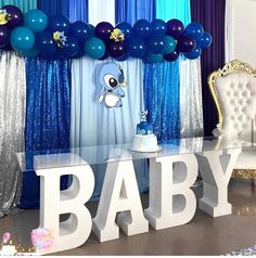 a baby shower party with balloons and decorations