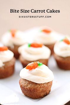 carrot cake cupcakes with white frosting and sprinkles on top