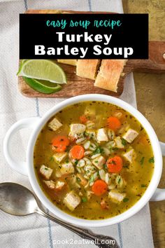 a bowl of turkey barley soup with carrots and celery