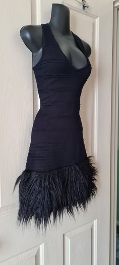 Mini Black Dress with Fur Trim on the bottom Very Goth 2000s Y2k Size Small. Will fit size 6-8 however it is very stretchy material so I believe even size 10 it will fit. Black Fitted Emo Mini Dress, Fitted Punk Style Mini Dress For Cosplay, Punk Style Fitted Mini Dress For Cosplay, Punk Style Fitted Mini Dress For Alternative Fashion, Fitted Sleeveless Emo Dress, Fitted Emo Style Party Dress, Fitted Emo Dress For Night Out, Fitted Emo Style Dress For Night Out, Alternative Style Sleeveless Fitted Mini Dress