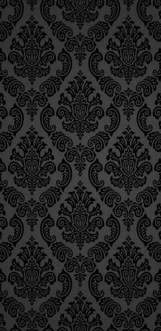 black and white wallpaper with an ornate design