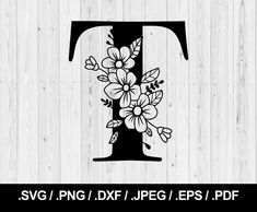 the letter f with flowers on it is shown in black and white