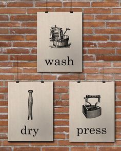 three posters hanging on a brick wall that say wash, dry, press and toothbrush