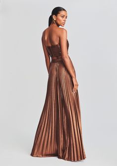 Our Sophia Top will quickly become the silver lining of your next night out. Zipped along the back, this strapless top wraps the bustier in lacquered pleats for a no slip sweetheart. Pair back to our Cressida Skirt for an award-winning look. Shown here in Chocolate. 95% Polyester, 5% Spandex Made in China Model is 5'11" wearing size S Style No. FW22-5642 Different Wedding Dresses, Australia Clothes, Maxi Styles, Silver Lining, Bride Look, Made In China, Denim Pant, Strapless Top, The Bride