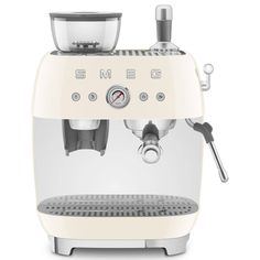 an espresso machine is shown on a white background with the words smeg above it