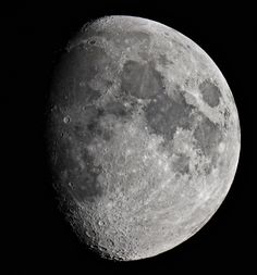 the moon is shown in black and white